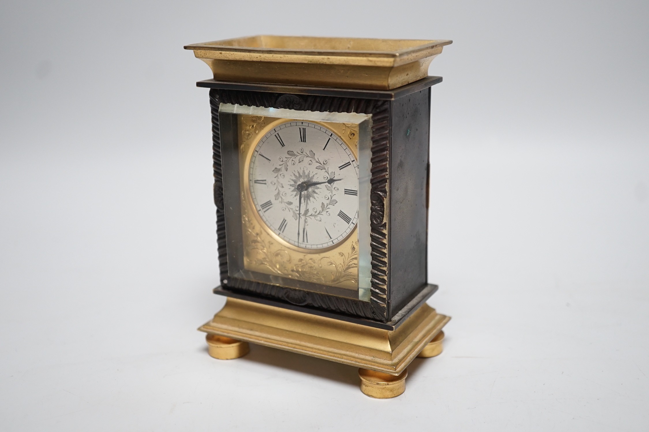 An 18th century pocket watch movement in later built bronze clock case. 12.5cm